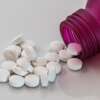 OTC sleeping tablets and herbal sleep remedies displayed in a UK pharmacy with a focus on sleep safety and side effects